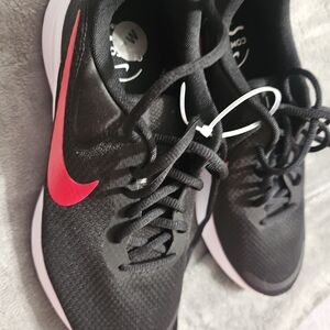 Nike Black Running Shoes with Pink Swoosh